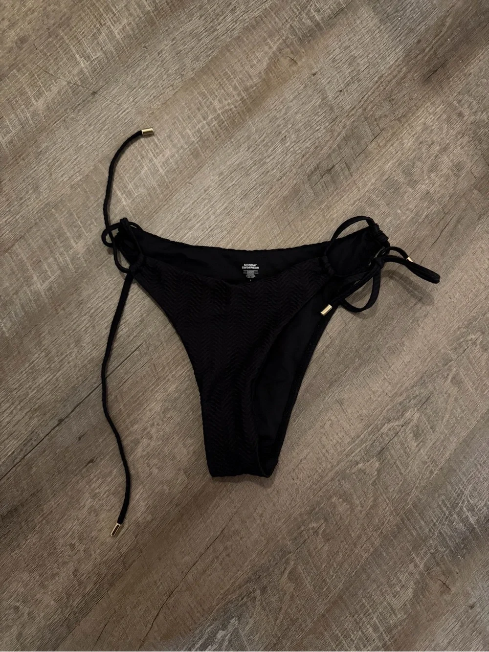 Monday Swimwear Black Tie-Side Bikini Bottom with Gold Tips